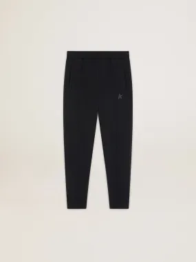 Men's black joggers with star on the front