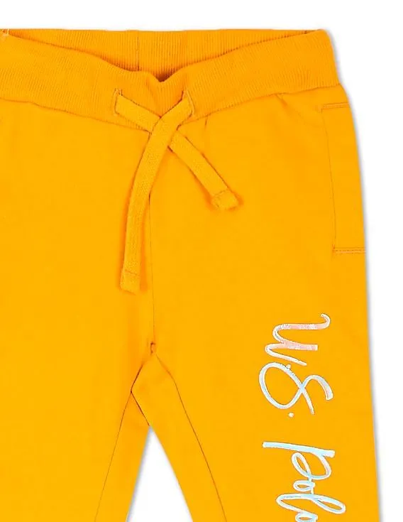 U.S. Polo Assn. Kids Girls Yellow Mid Rise Solid Joggers