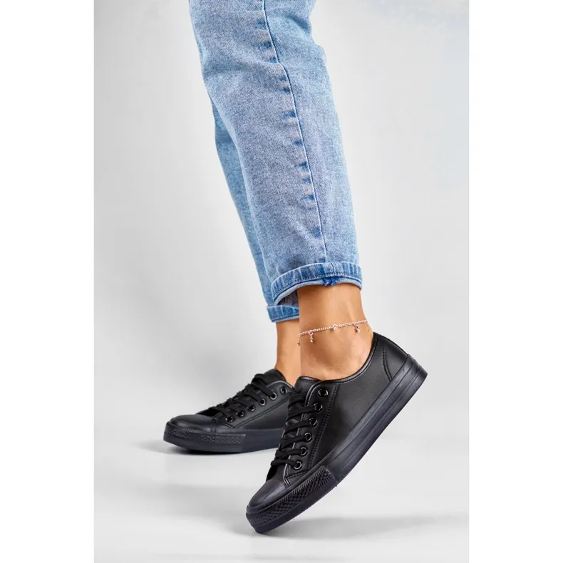 Women's eco-leather sneakers with a black sole